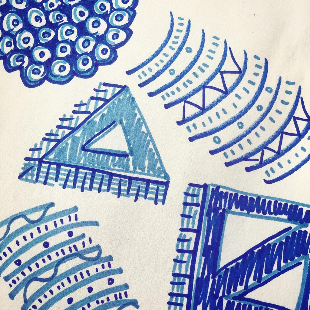 desk doodles in blue